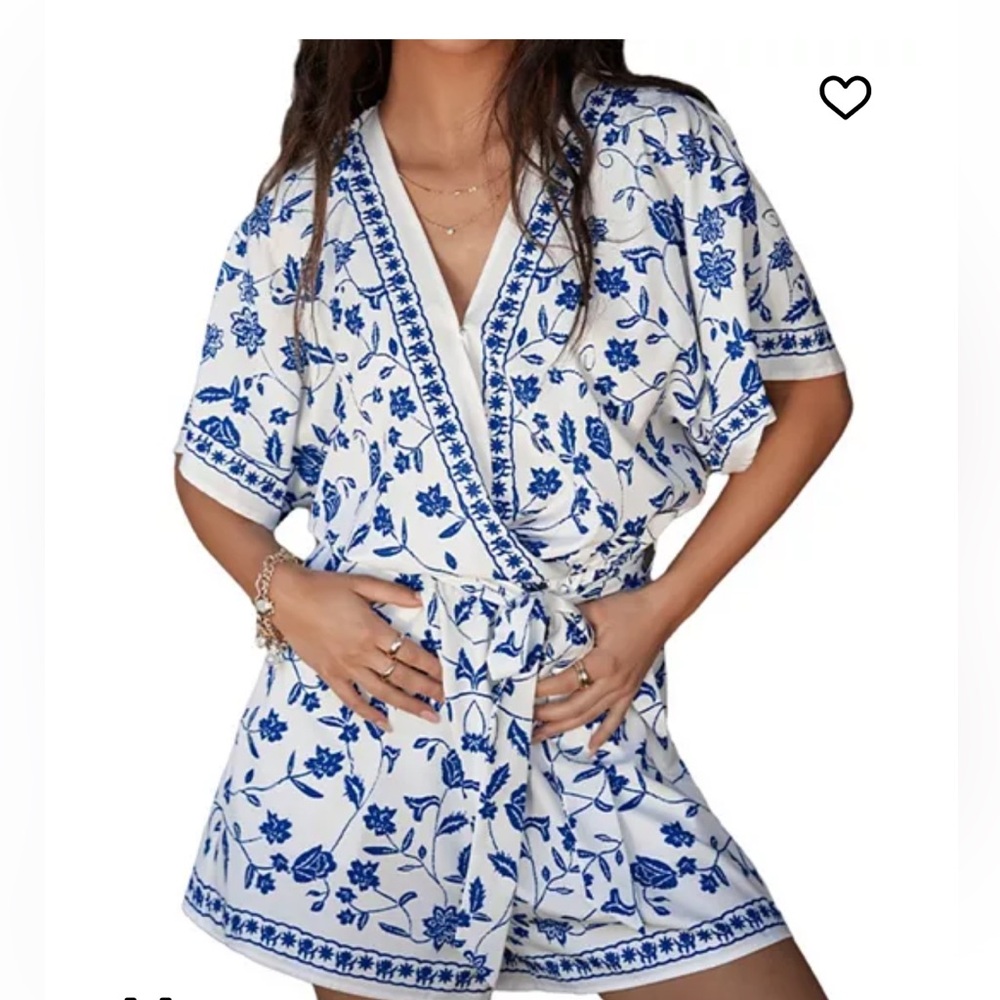 New with tags feminine White & Blue Floral Wrap Romper - size Small